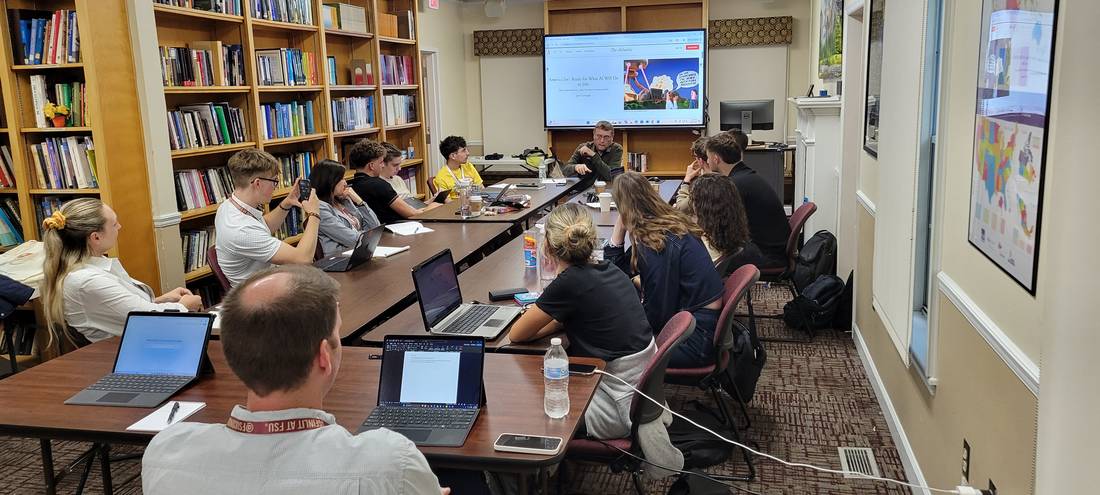 Students and faculty at the Academy